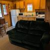 love seat and kitchen